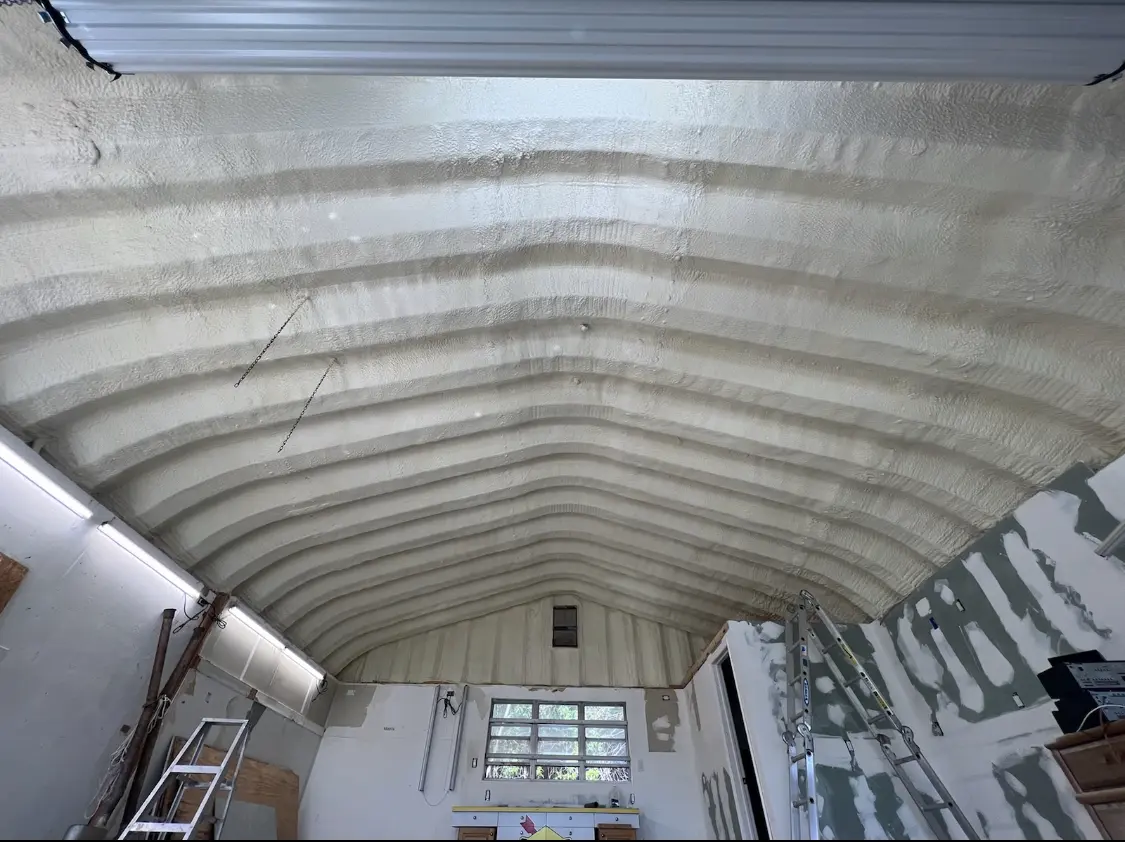 Spray polyurethane foam applied to the underside of a metal roof deck in Huntington Park
